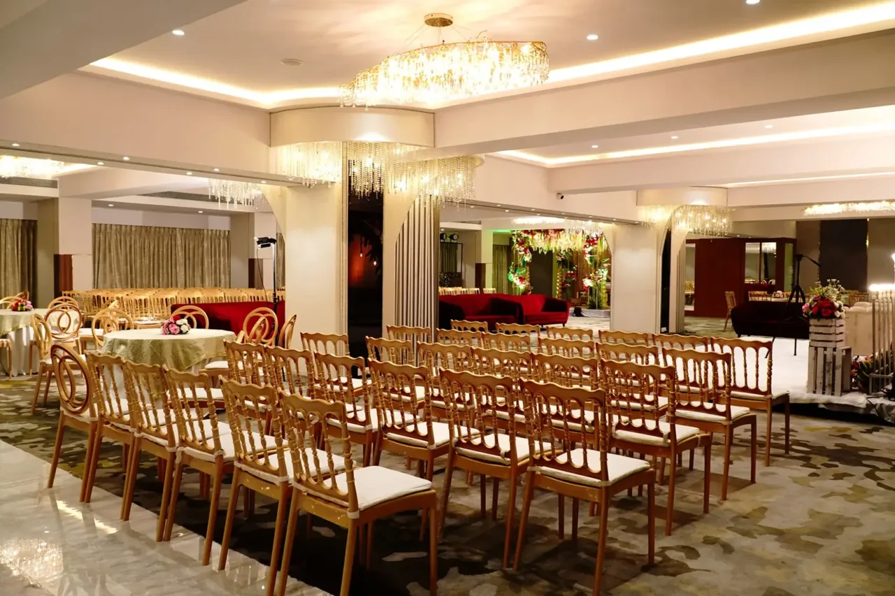 Banquet hall serving Dahisar — gold-and-white interior